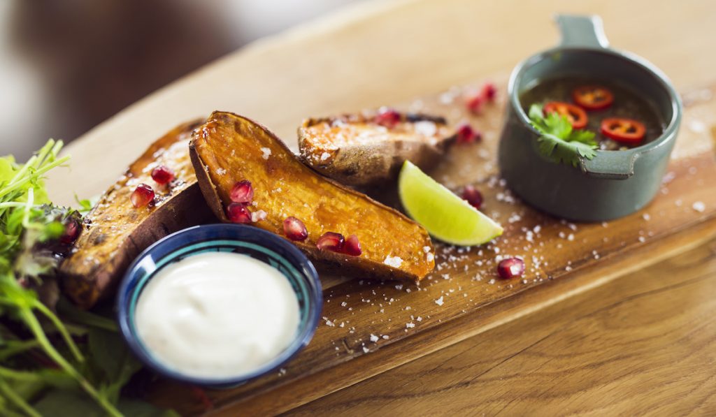 baked sweet potato with different dips 