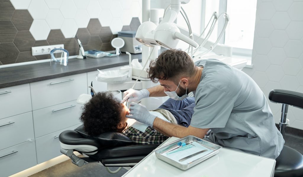 dentist examining patient